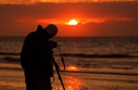 Fotograaf Lutfi in Kwade Hoek strand