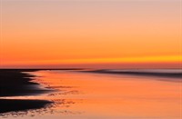 Avondlicht op strand van 